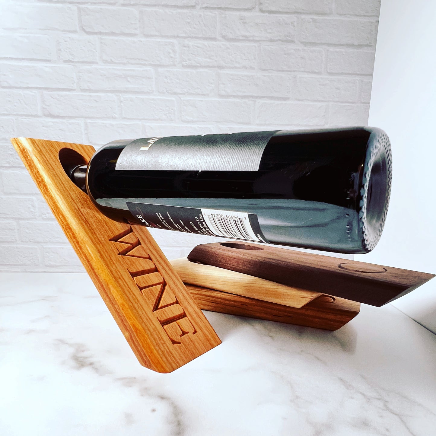 Balancing wine bottle holder