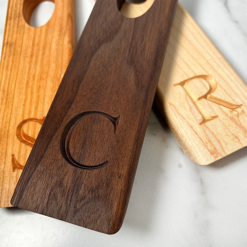 Three Balancing wine bottle holders