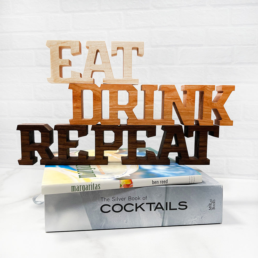 Standing words - Eat Drink Repeat wood sign.