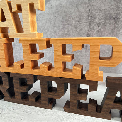 A set of Standing words - Eat Sleep Repeat.