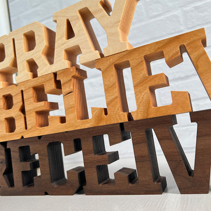 Standing words - Pray Believe Receive wooden letters.