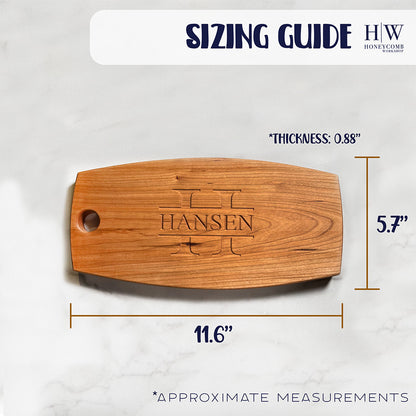 A wooden cheese board with the word hansen on it.