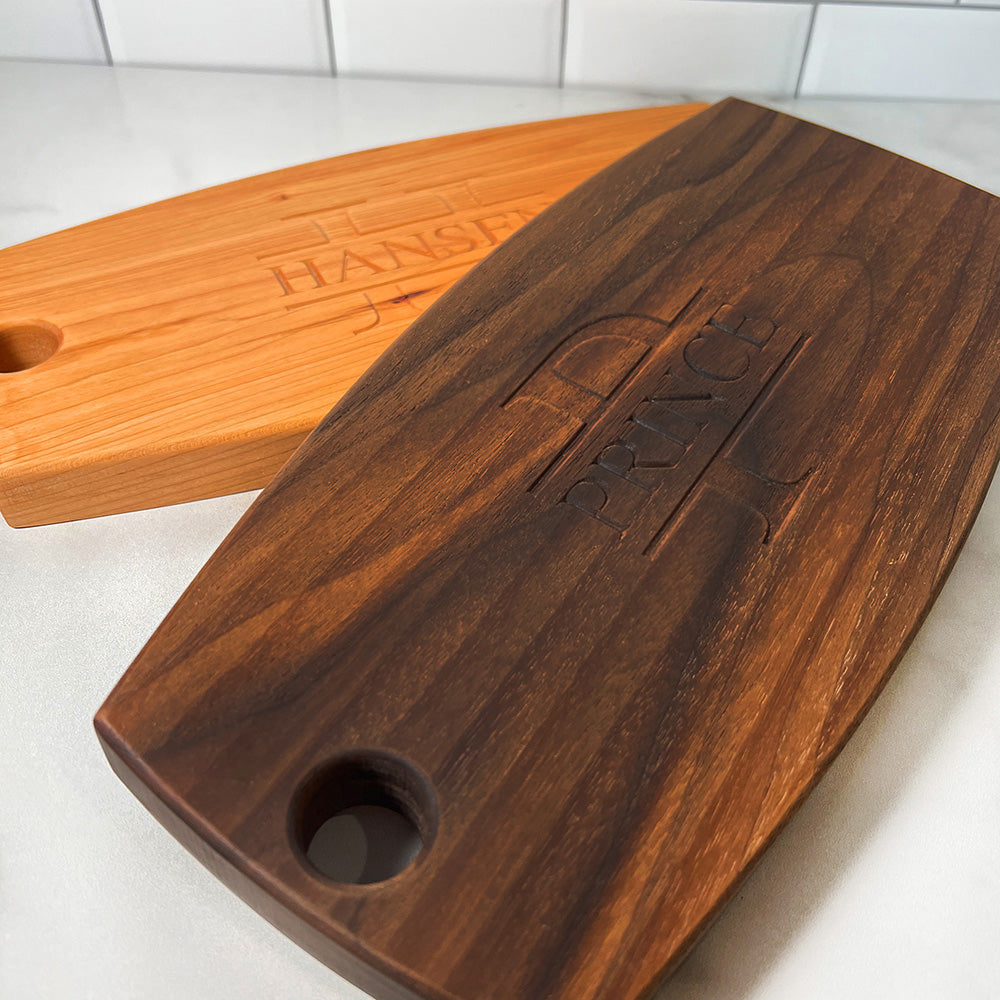 Two Cheese Boards on a counter top.