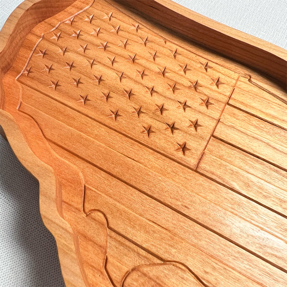 A wooden tray with an USA Map & Flag wood tray on it.